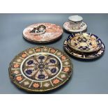 Two Royal Crown Derby Imari pattern plates, three Crown Derby plates or saucers, a Royal Crown Derby