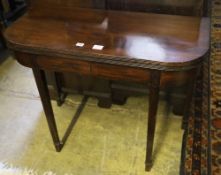 A George III mahogany folding card table, width 95cm depth 45cm height 74cm