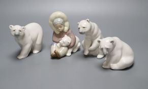 Three Lladro polar bears and an Inuit figure, 12cmCONDITION: All in good condition