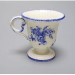 An Orleans porcelain blue enamelled pedestal coffee cup, c.1780 (repair), 6.7cmCONDITION: Minor