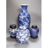 Three Chinese blue and white jars and a tall vase, late 19th/early 20th century, tallest vase 44.