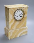 A French cream onyx mantel clock, height 30cm