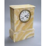 A French cream onyx mantel clock, height 30cm