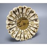 A Japanese Meiji period ivory and lacquered chrysanthemum form dish, diameter 20cmCONDITION: Some