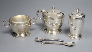 A modern cased silver three piece condiment set, with two later spoons, Wakely & Wheeler, London,