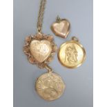 A 9ct gold heart-shaped fancy locket on 9ct chain, a 9ct gold engraved circular locket, a small