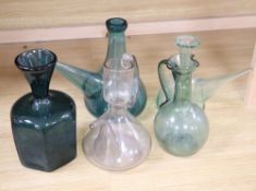 Four 19th/20th century French coloured glass porron decanters and a vine engraved carafe, 20.5 -