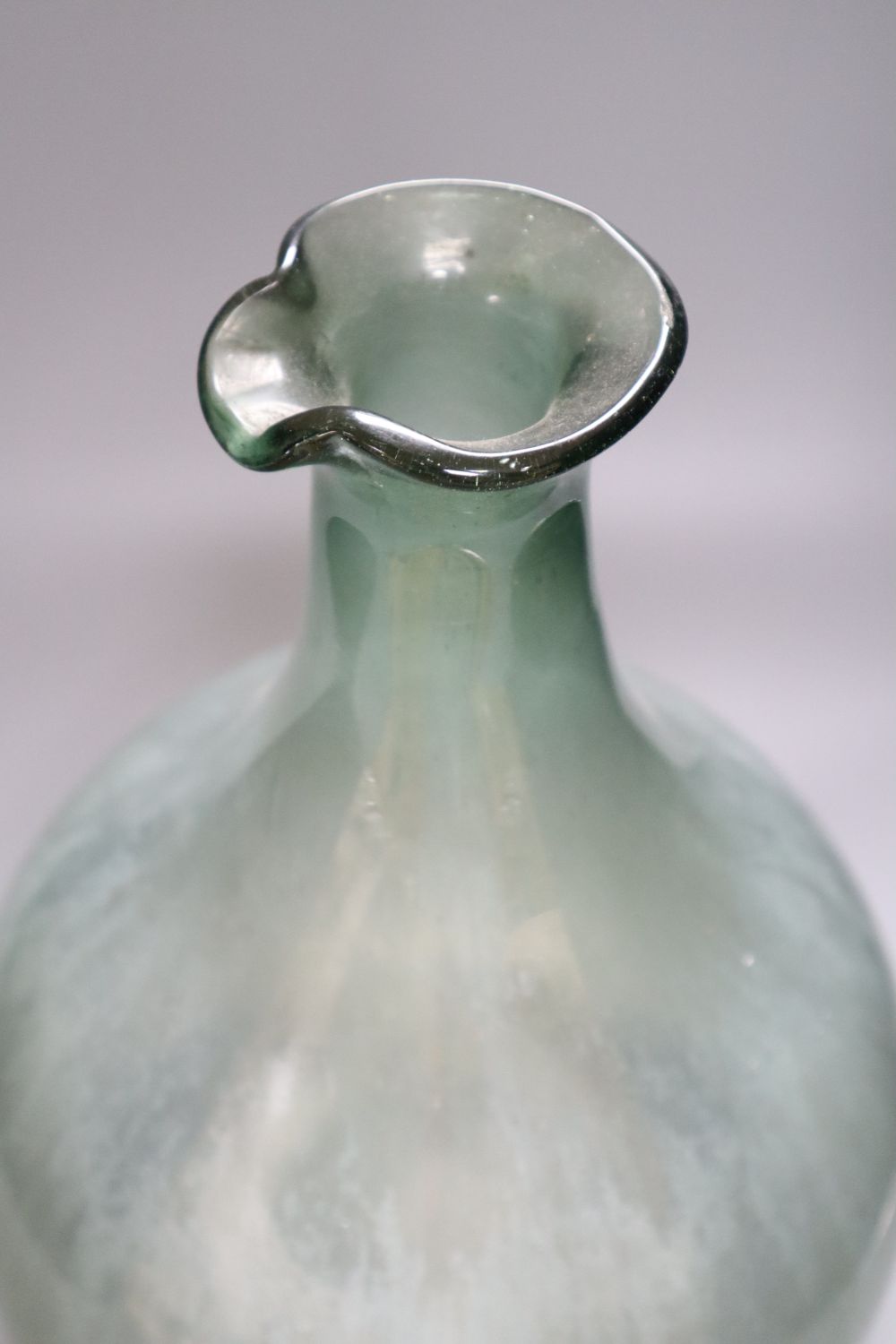 An olive glass demi-john, probably 19th century French 42cm highCONDITION: Provenance - Andrew - Image 2 of 3