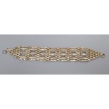 A 9ct gold articulated brick-link bracelet (a.f.), overall 17.2 cm, 11.8g.CONDITION: No clasp.
