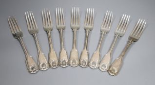 A set of nine Victorian silver double struck, fiddle, thread and shell pattern tableforks, Elizabeth