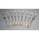 A set of nine Victorian silver double struck, fiddle, thread and shell pattern tableforks, Elizabeth