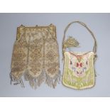 A silver and gold beadwork evening purse, 27cm and a needlework evening purse, 16cmCONDITION:
