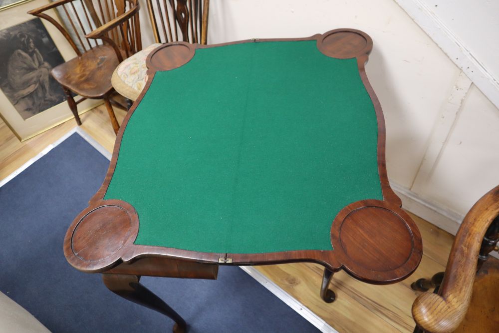 A George I red walnut serpentine top card table, with dished corners, frieze drawer and slender - Image 2 of 3