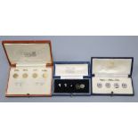 Two cased sets of four 18ct and Plat buttons, one set with sapphires and five other buttons, 18ct