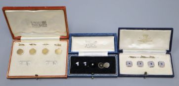 Two cased sets of four 18ct and Plat buttons, one set with sapphires and five other buttons, 18ct