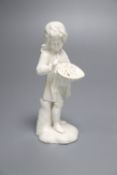 A Hochst white glazed figure of a boy holding flowers, late 18th century, 11.5cm