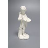 A Hochst white glazed figure of a boy holding flowers, late 18th century, 11.5cm