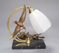 A French Art Deco 'seagull' table lamp, on marble base, stamped bronze, height 26cm