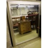 A large contemporary silvered frame wall mirror, 127 x 158cm