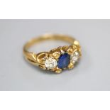 A late Victorian 18ct gold, sapphire and diamond three stone ring, size I/J, gross 3.2 grams.