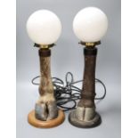 A pair of taxidermic hoof lamps, approximately 52cm including shade