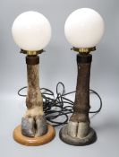 A pair of taxidermic hoof lamps, approximately 52cm including shade