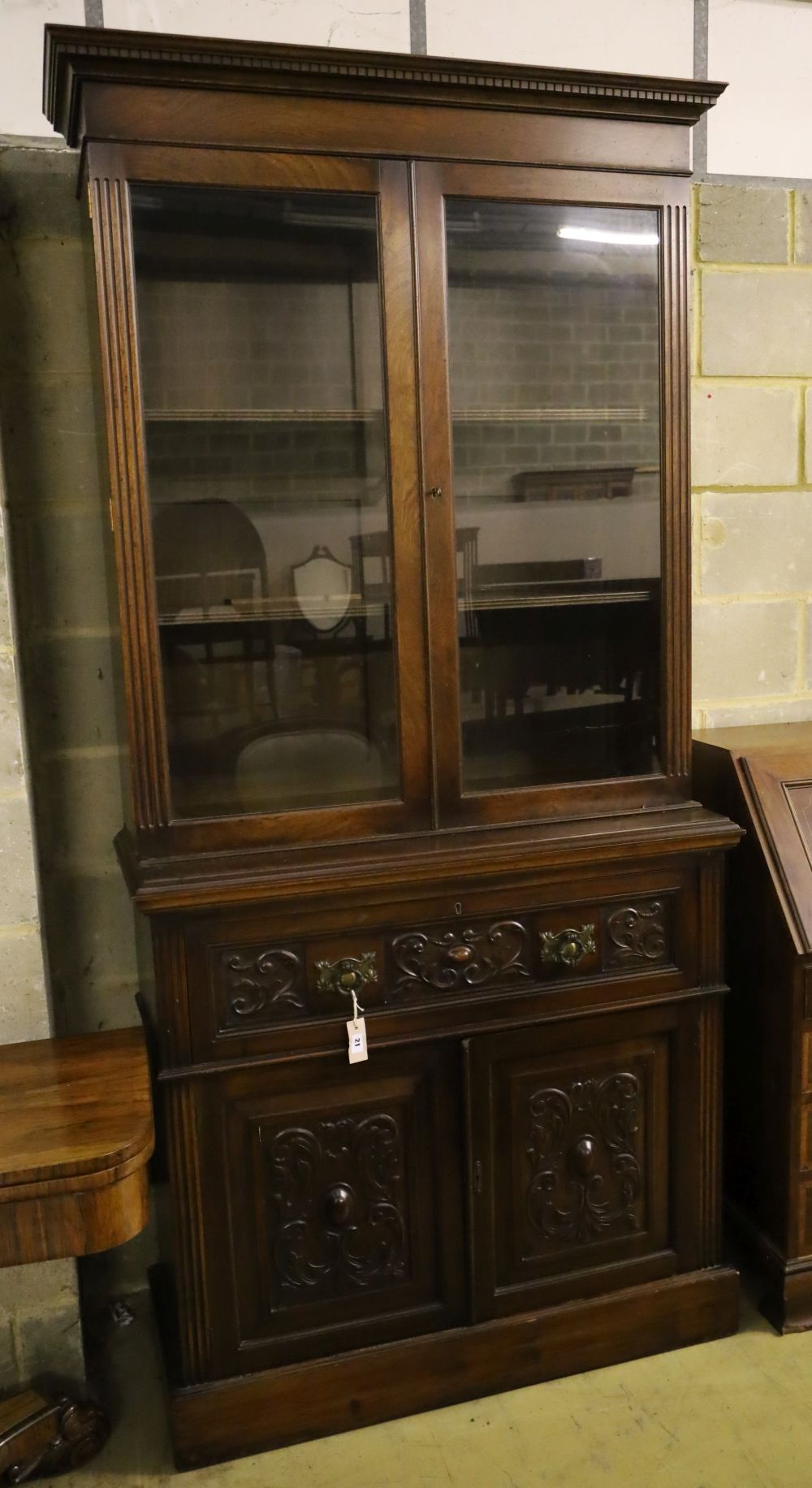 A late Victorian walnut secretaire bookcase, width 105cm depth 46cm height 226cm