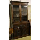 A late Victorian walnut secretaire bookcase, width 105cm depth 46cm height 226cm