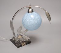 An Art Deco chrome kingfisher table lamp, on marble base with pale blue glass shade