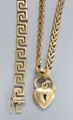 A yellow metal Greek Key link bracelet(a.f.) 19cm and a 9kt chain link bracelet with heart-shaped