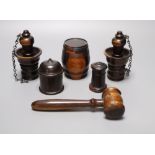 A group of 19th century lignum vitae objects: A pair of whistles and holsters, a match holder with