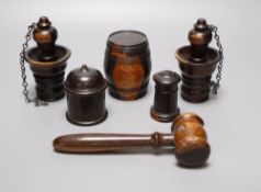 A group of 19th century lignum vitae objects: A pair of whistles and holsters, a match holder with