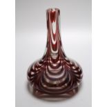 A Victorian red trail glass carafe with bold concentric looped decoration, 20cm highCONDITION: