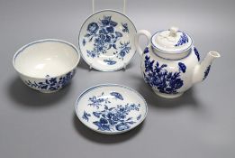 A Worcester 'Three Flowers' teapot and cover, sugar bowl and two saucers, c.1775, teapot height