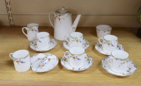 A Royal Paragon thorn patterned coffee set, coffee pot 15cm highCONDITION: One saucer broken, the