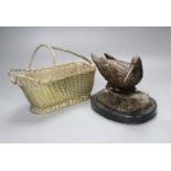 A Christofle silver plated wine basket, length 24cm and a bronze model of a wading bird, on oval