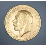 A George V 1912 gold sovereign.