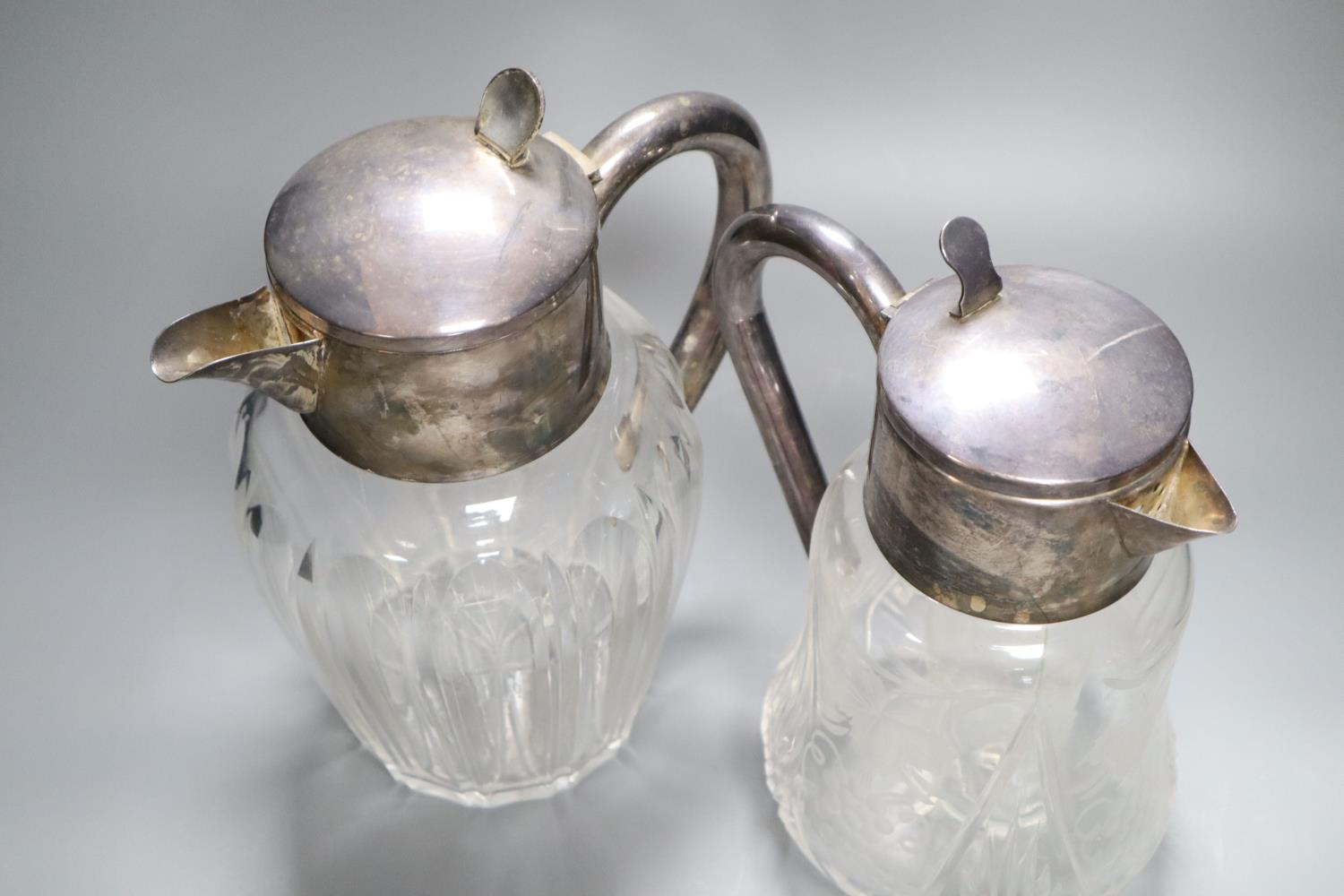 Two silver plated and glass lemonade jugs, 27cm and 24cm - Image 2 of 2