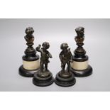 A pair of Regency small bronze busts and a pair of figures of cherubs, tallest 16cm