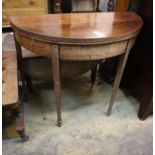 A George III inlaid mahogany D shaped folding card table, width 88cm, depth 42cm, height 75cm