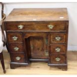 A mid 18th century walnut kneehole desk, width 76cm, depth 43cm, height 73cm