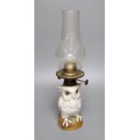 A Possneck porcelain 'owl' novelty oil lamp, total height including chimney 37.5cm