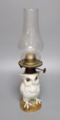 A Possneck porcelain 'owl' novelty oil lamp, total height including chimney 37.5cm