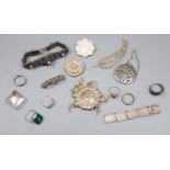 Mixed jewellery including silver brooch and white metal bracelets.