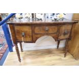 A small Regency mahogany bow front sideboard, width 107cm, depth 50cm, height 82cm