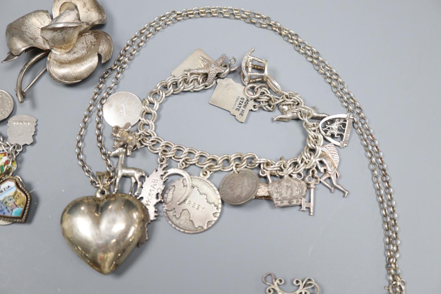 A white metal charm bracelet hung with enamel medallions, one other charm bracelet, marcasite - Image 3 of 5