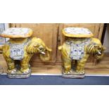 A pair of terracotta elephant garden seats