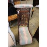 A Victorian carved mahogany prie dieu chair