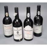 Four bottles of vintage port; two Graham's Malvedos 1976 and 1984, one Warres Quinta da Cavadinha