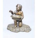A small Victorian bronze figure of a child and basket, height 12.5cm
